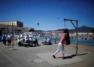 Chris Willis, 34, works out in the exercise yard at San Quentin state prison